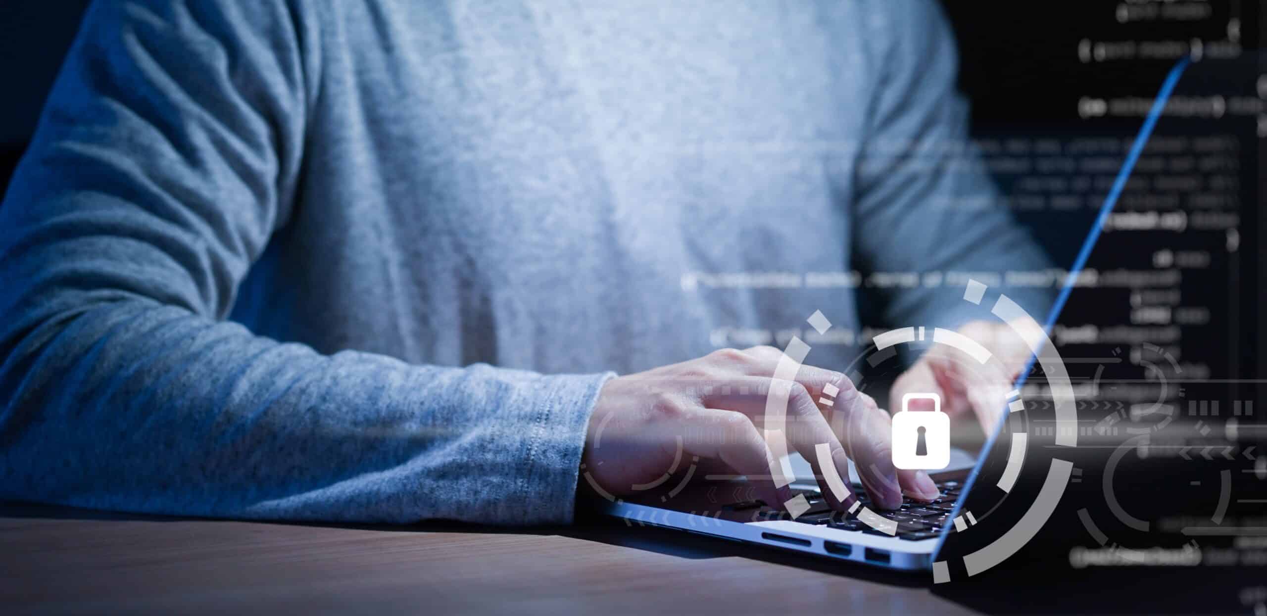 close up programmer man hand (employee) typing computer language (binary code) to input on security system to protect and prevent malware (virus) for cyber security concept