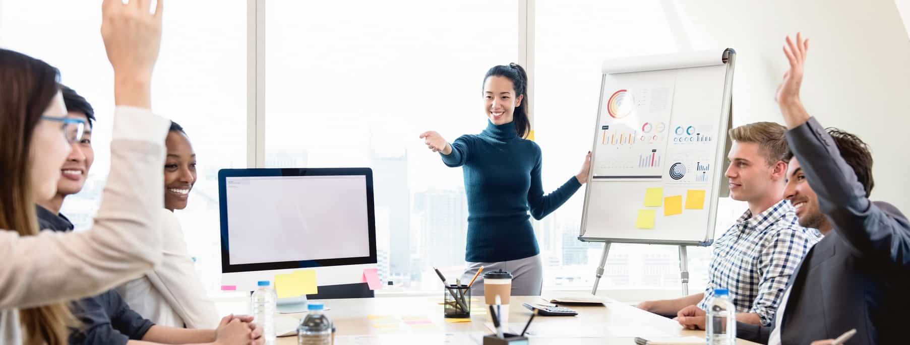 Young casual Asian businesswoman leader asking for opinion in the meeting while making a presentation, panoramic banner background